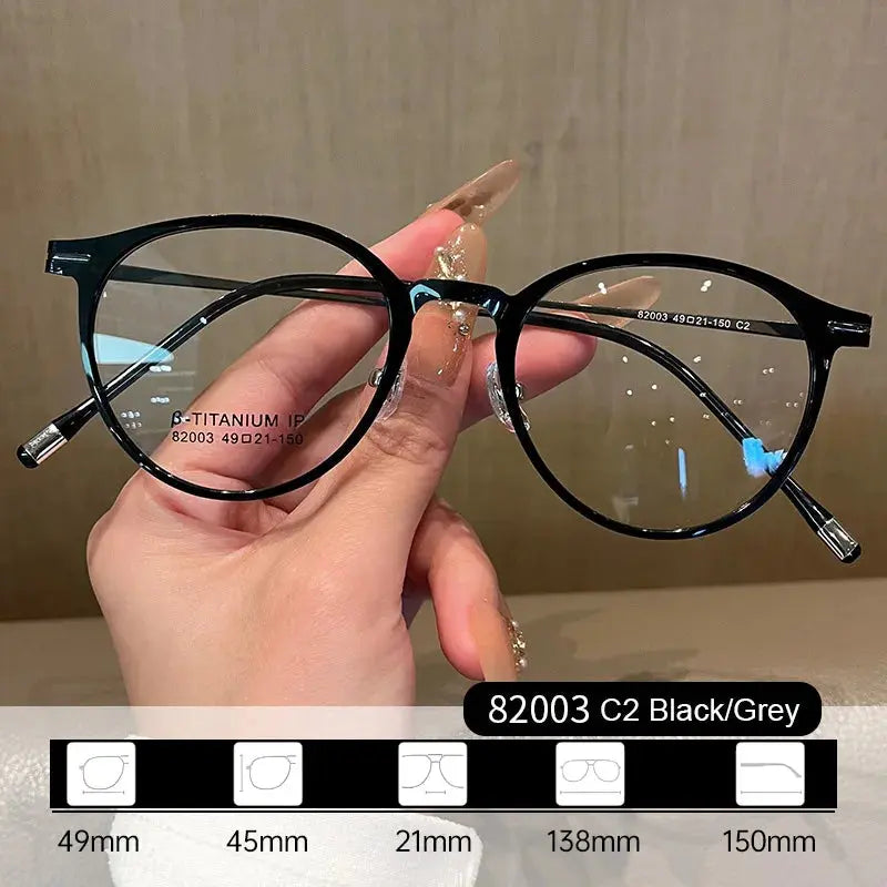 Women's Oval Full Rim Titanium Prescription Glasses 82003 — view 7 | Rx Spectacle