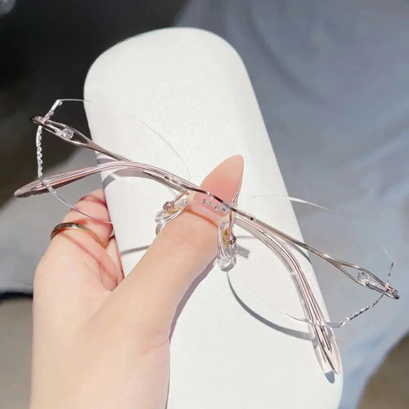 Women's Oval Rimless Titanium Prescription Glasses 698081 — view 4 | Rx Spectacle