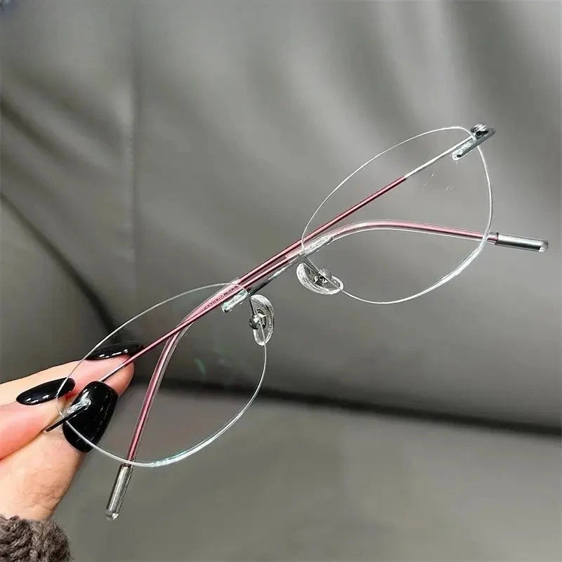 Women's Oval Rimless Titanium Prescription Glasses 696071 — view 6 | Rx Spectacle