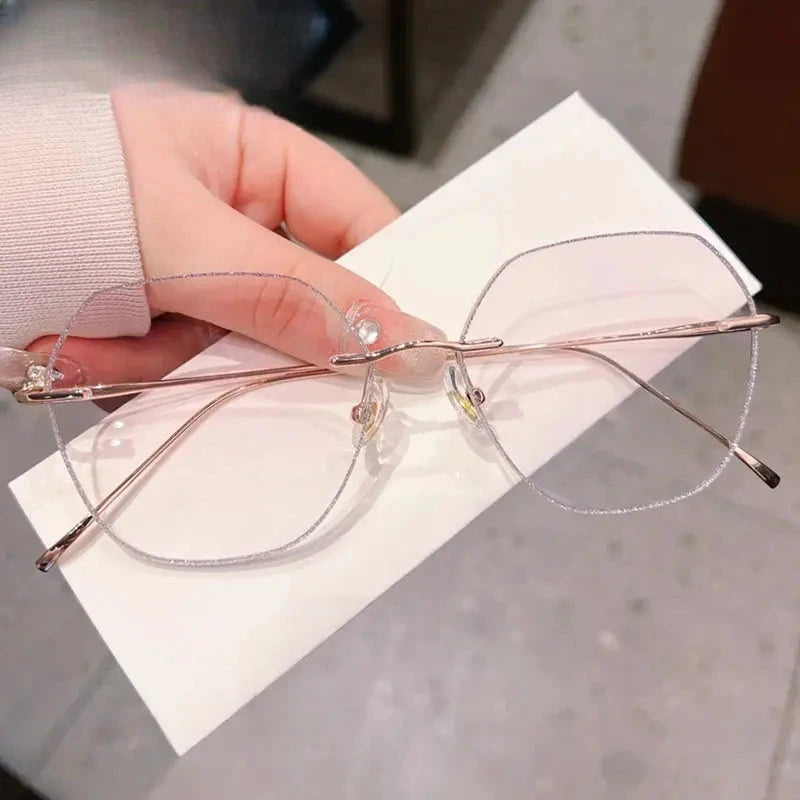 Women's Polygon Rimless Titanium Flat Top Prescription Glasses 435218 — view 7 | Rx Spectacle