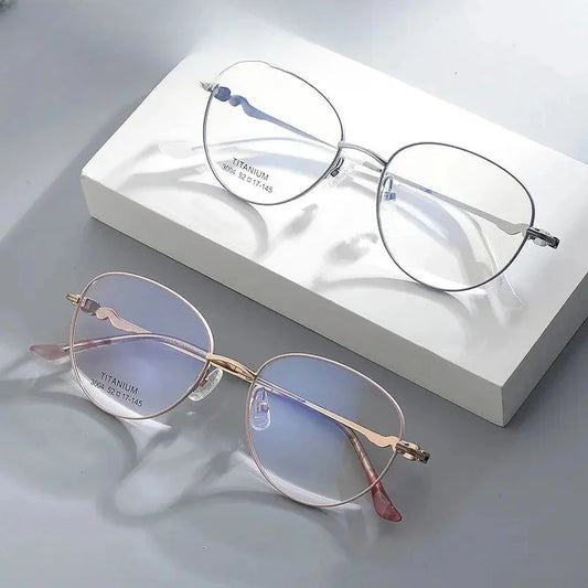 Women's Oval Full Rim Titanium Prescription Glasses 83004 — view 1 | Rx Spectacle