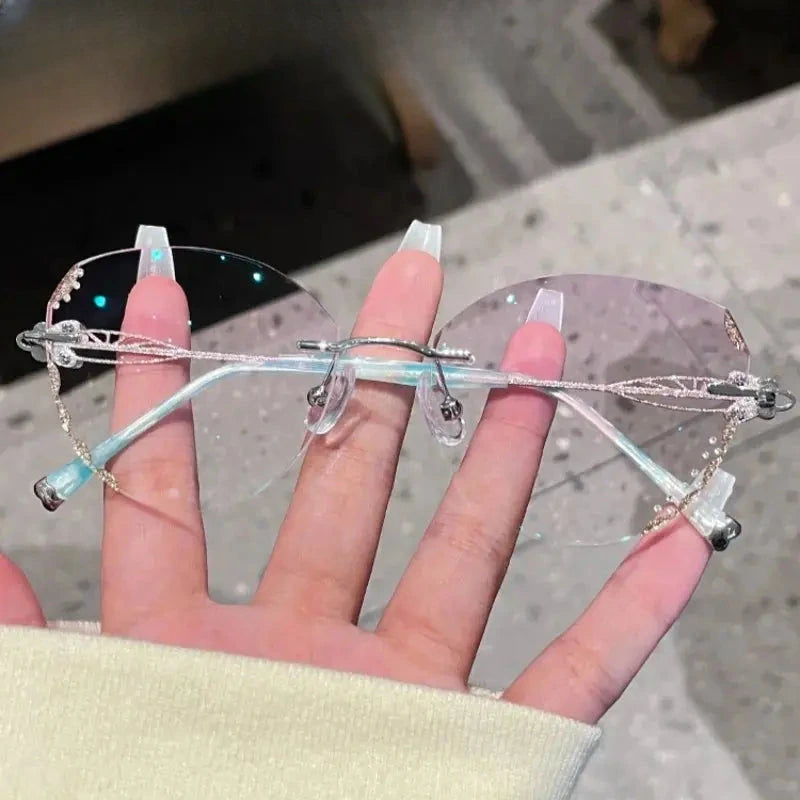 Women's Butterfly Rimless Titanium Prescription Glasses 580513 — view 2 | Rx Spectacle