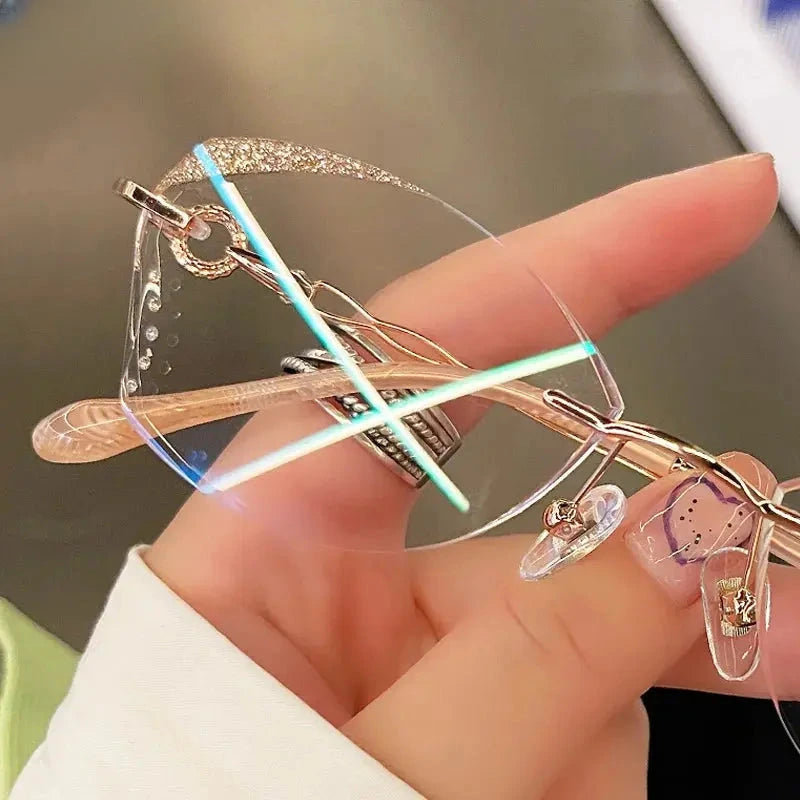 Women's Oval Rimless Titanium Prescription Glasses 318884 — view 1 | Rx Spectacle
