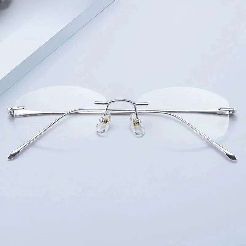 Women's Oval Rimless Titanium Prescription Glasses 81454 — view 1 | Rx Spectacle