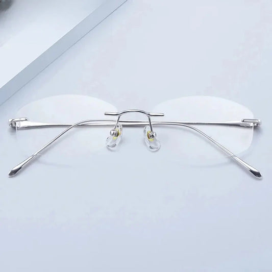 Women's Oval Rimless Titanium Prescription Glasses 81454 — view 1 | Rx Spectacle