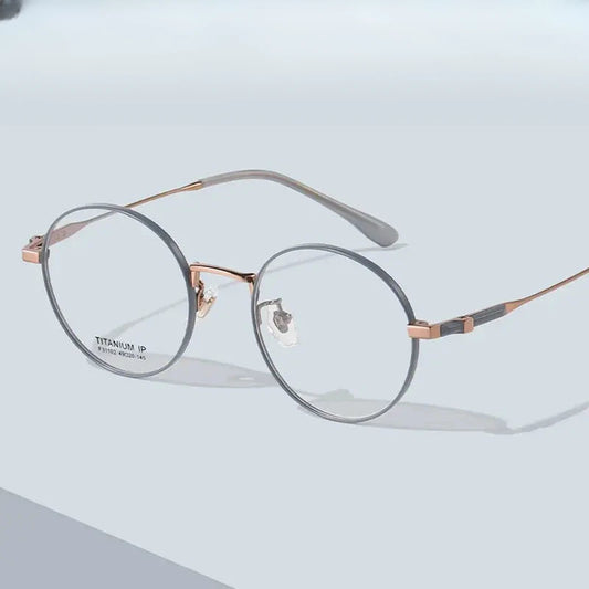 Women's Round Full Rim Titanium Prescription Glasses 31102 — view 1 | Rx Spectacle