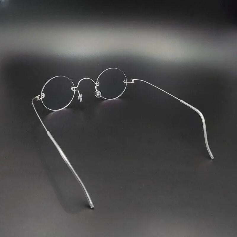 Unisex Round Rimless Stainless Steel Prescription Glasses Y017 — view 8 | Rx Spectacle