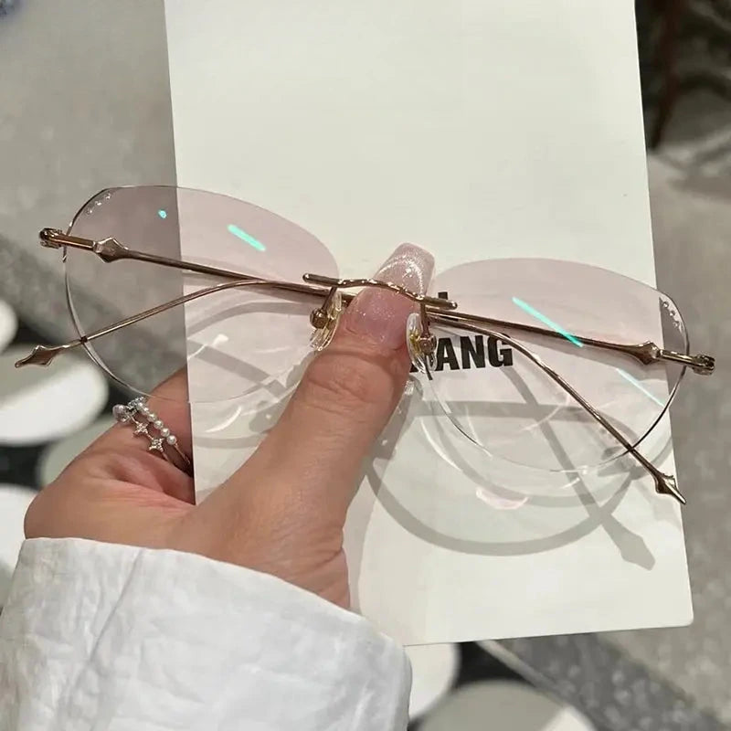 Women's Butterfly Rimless Titanium Prescription Glasses 699560 — view 3 | Rx Spectacle
