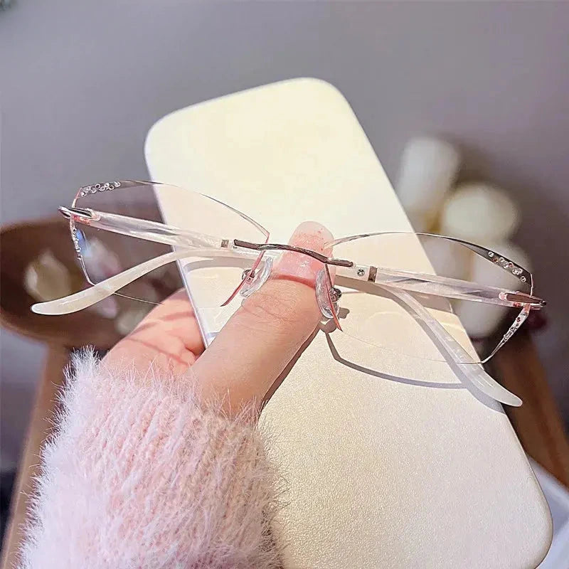 Women's Cat Eye Rimless Titanium Prescription Glasses 520254 — view 1 | Rx Spectacle