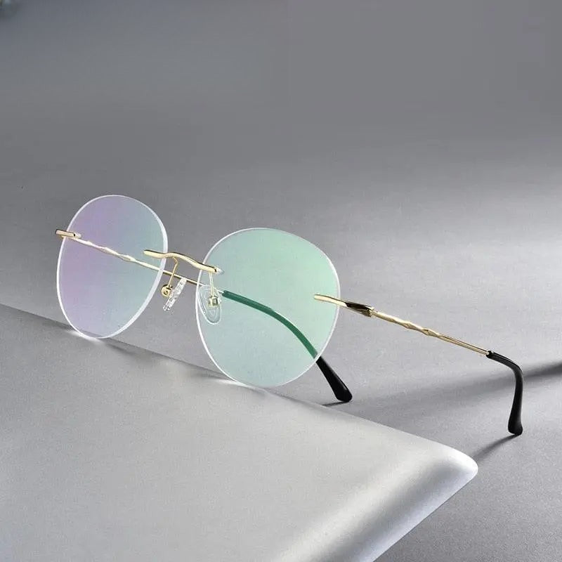 Unisex Round Rimless Titanium Prescription Glasses S7057 — view 1 | Rx Spectacle