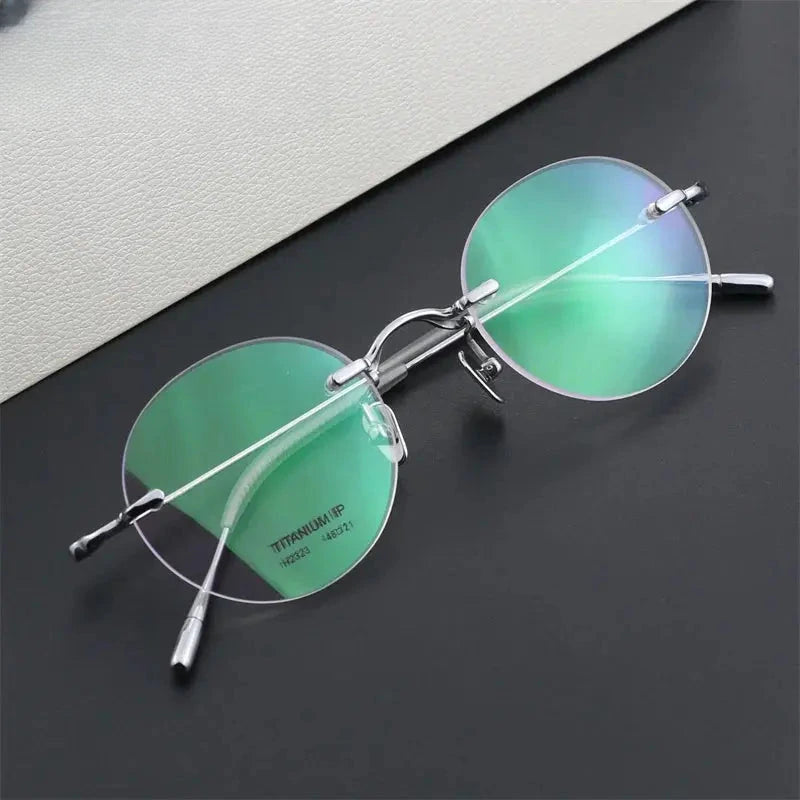 Women's Round Rimless Titanium Prescription Glasses 232376 — view 1 | Rx Spectacle