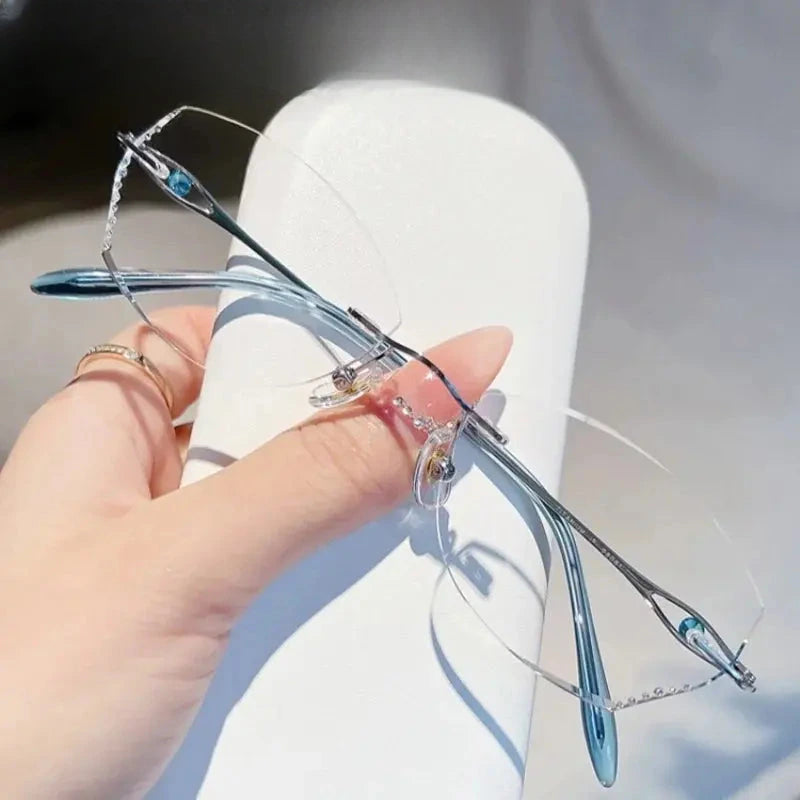 Women's Oval Rimless Titanium Prescription Glasses 698081 — view 4 | Rx Spectacle