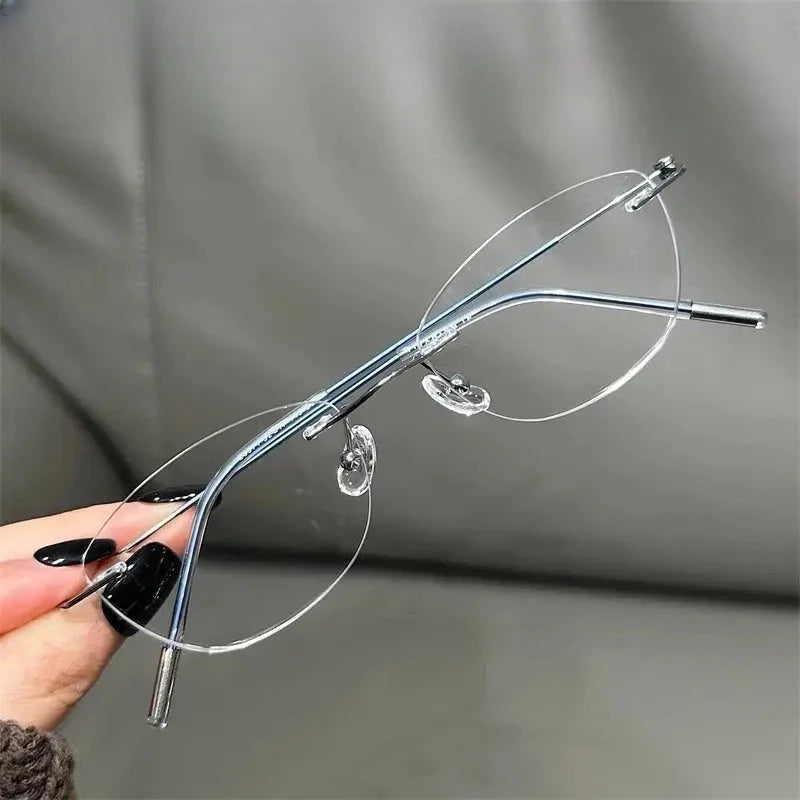 Women's Oval Rimless Titanium Prescription Glasses 696071 — view 5 | Rx Spectacle
