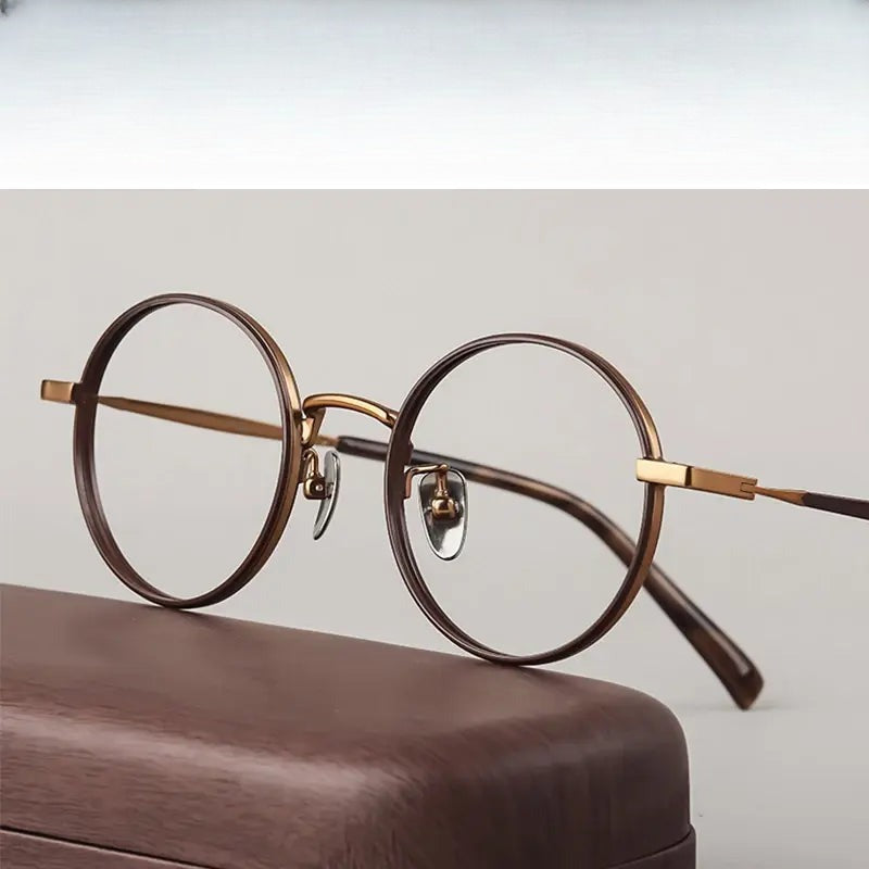 Women's Round Full Rim Titanium Prescription Glasses 698505 — view 1 | Rx Spectacle