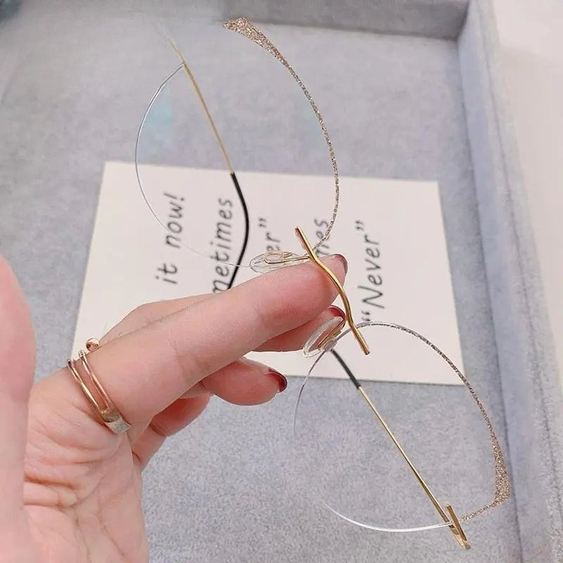 Women's Cat Eye Rimless Titanium Prescription Glasses 16016c — view 4 | Rx Spectacle
