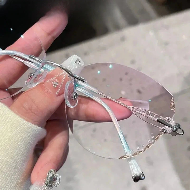 Women's Butterfly Rimless Titanium Prescription Glasses 580513 — view 1 | Rx Spectacle