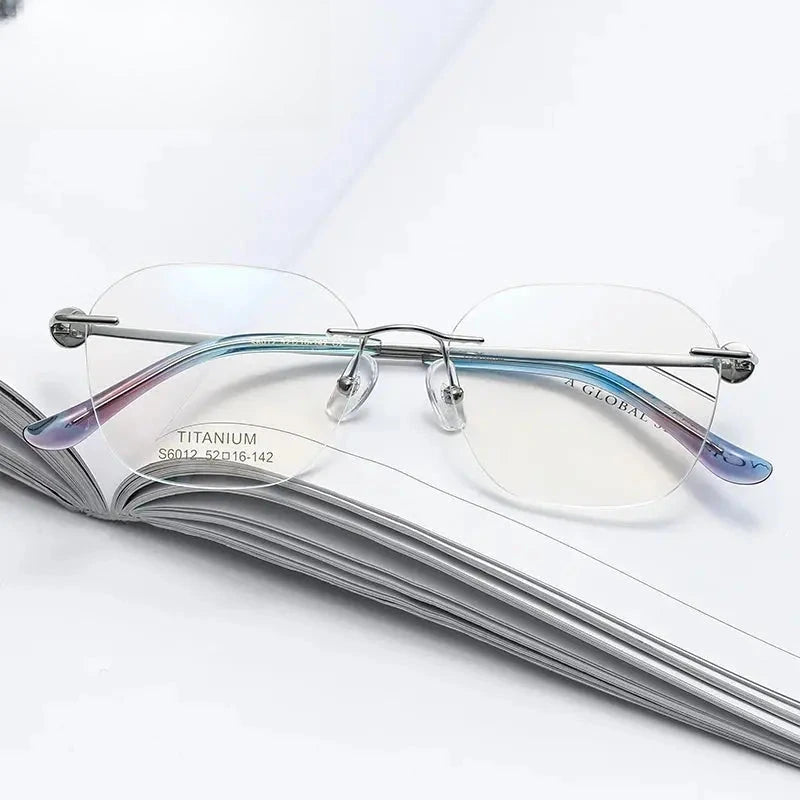 Women's Oval Rimless Titanium Prescription Glasses 196012 — view 1 | Rx Spectacle