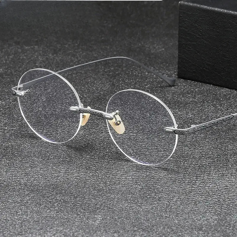 Women's Round Rimless Titanium Prescription Glasses 875933 — view 1 | Rx Spectacle