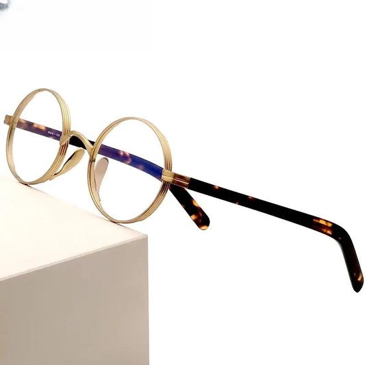 Women's Round Full Rim Titanium Prescription Glasses 66101 — view 1 | Rx Spectacle