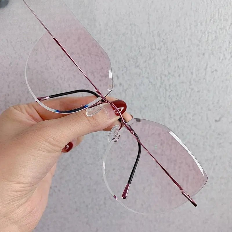Women's Cat Eye Rimless Titanium Prescription Glasses 16016a — view 2 | Rx Spectacle