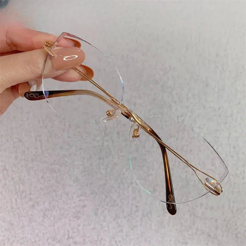 Women's Cat Eye Rimless Titanium Prescription Glasses 1337 — view 1 | Rx Spectacle