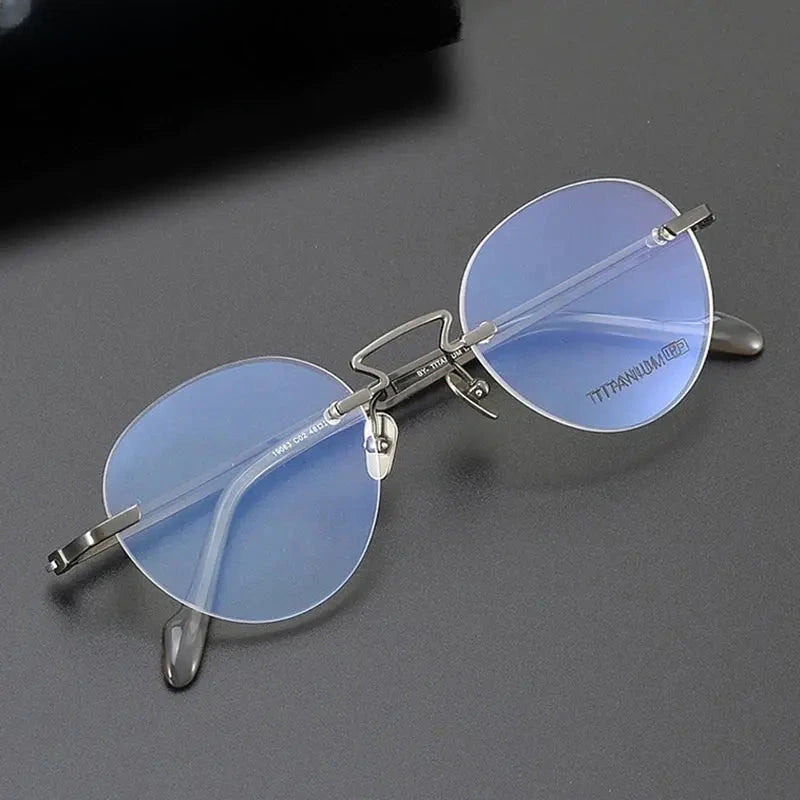 Women's Round Rimless Titanium Prescription Glasses 419063 — view 1 | Rx Spectacle