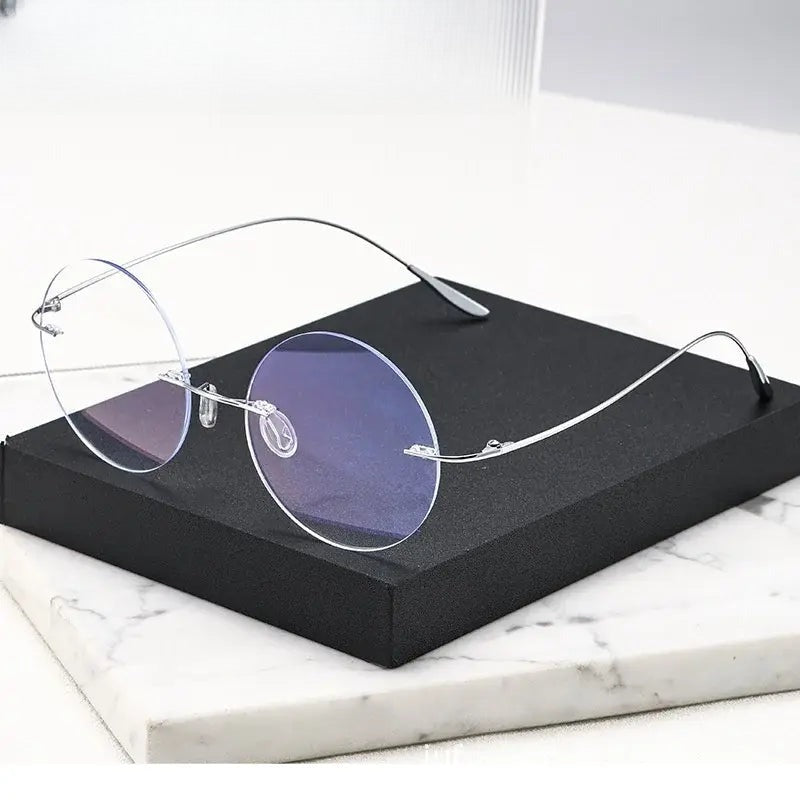 Women's Round Rimless Prescription Glasses 720176 — view 1 | Rx Spectacle