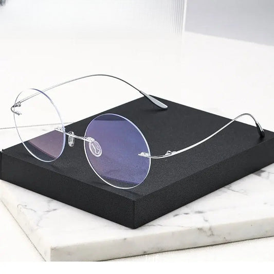 Women's Round Rimless Prescription Glasses 720176 — view 1 | Rx Spectacle