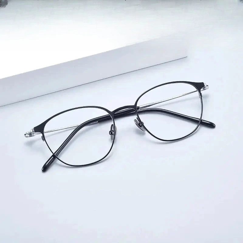 Women's Oval Full Rim Titanium Prescription Glasses 81481 — view 1 | Rx Spectacle