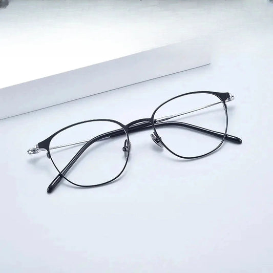 Women's Oval Full Rim Titanium Prescription Glasses 81481 — view 1 | Rx Spectacle