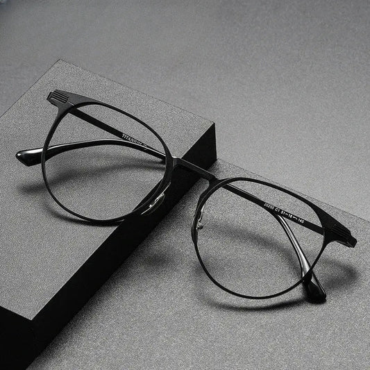 Unisex Round Full Rim Titanium Prescription Glasses 20250 — view 1 | Rx Spectacle