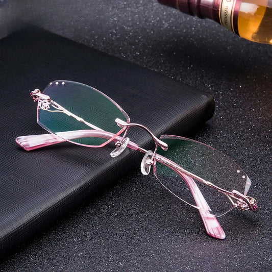 Women's Oval Rimless Titanium Prescription Glasses 80159 — view 1 | Rx Spectacle