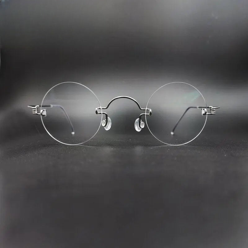 Unisex Round Rimless Stainless Steel Prescription Glasses Y017 — view 1 | Rx Spectacle