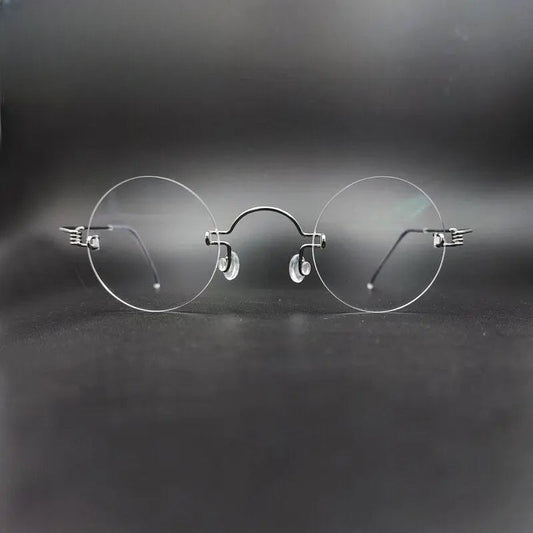 Unisex Round Rimless Stainless Steel Prescription Glasses Y017 — view 1 | Rx Spectacle