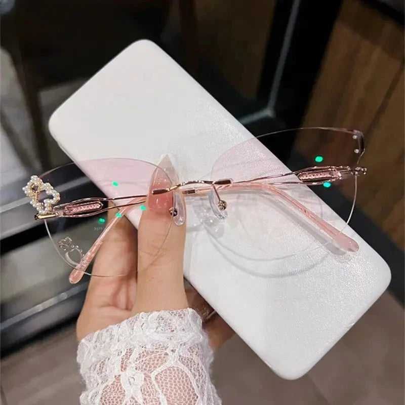 Women's Cat Eye Rimless Titanium Prescription Glasses 001 — view 1 | Rx Spectacle