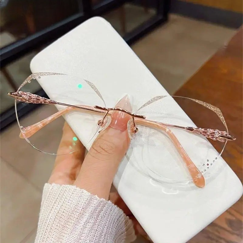 Women's Round Rimless Titanium Prescription Glasses 156 — view 7 | Rx Spectacle