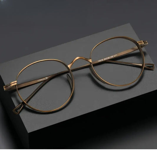 Women's Oval Full Rim Titanium Prescription Glasses 610519 — view 1 | Rx Spectacle