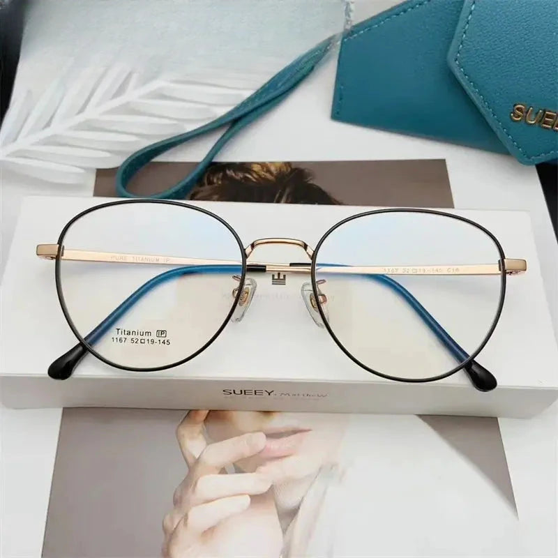 Unisex Oval Full Rim Titanium Prescription Glasses 611167 — view 6 | Rx Spectacle