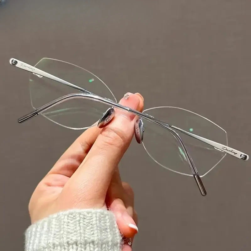Women's Cat Eye Rimless Titanium Prescription Glasses 60254 — view 3 | Rx Spectacle