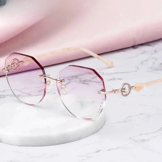 Women's Round Rimless Titanium Flat Top Prescription Glasses 461813 — view 1 | Rx Spectacle