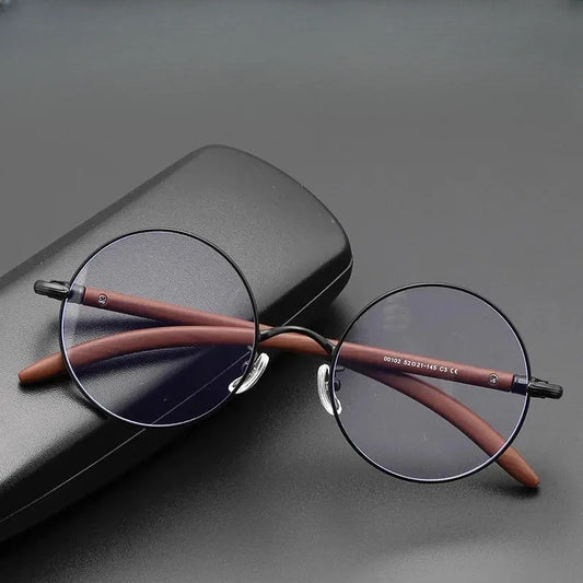 Unisex Round Full Rim Titanium Prescription Glasses 411102 — view 1 | Rx Spectacle