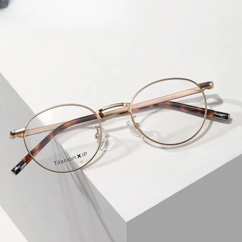 Women's Oval Full Rim Titanium Prescription Glasses 842905 — view 1 | Rx Spectacle