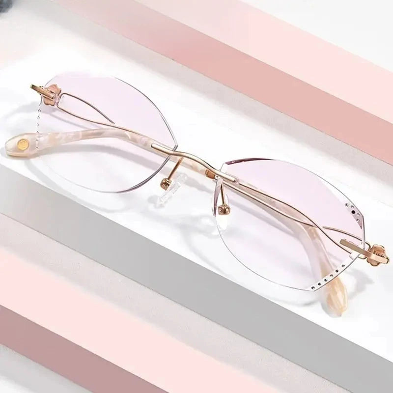 Women's Oval Rimless Titanium Prescription Glasses 699038 — view 1 | Rx Spectacle