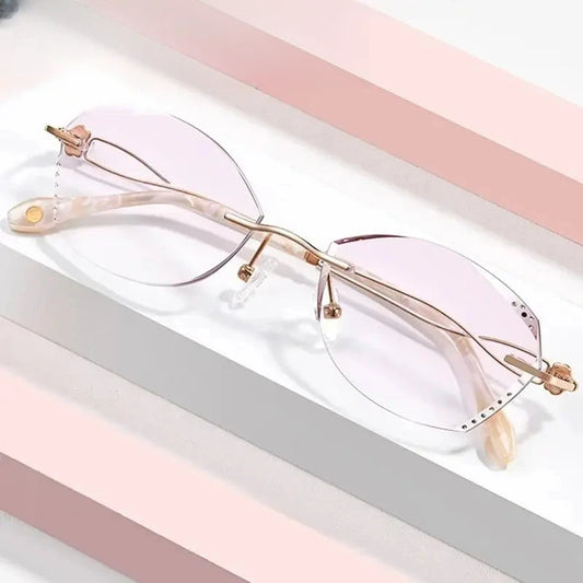 Women's Oval Rimless Titanium Prescription Glasses 699038 — view 1 | Rx Spectacle