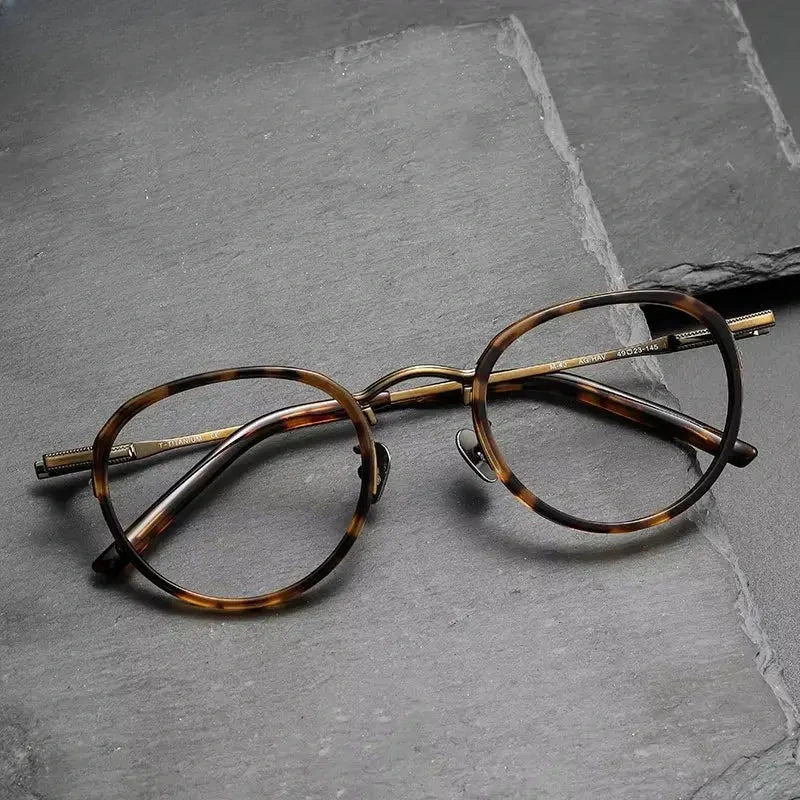 Unisex Oval Full Rim Titanium Prescription Glasses 369430 — view 1 | Rx Spectacle