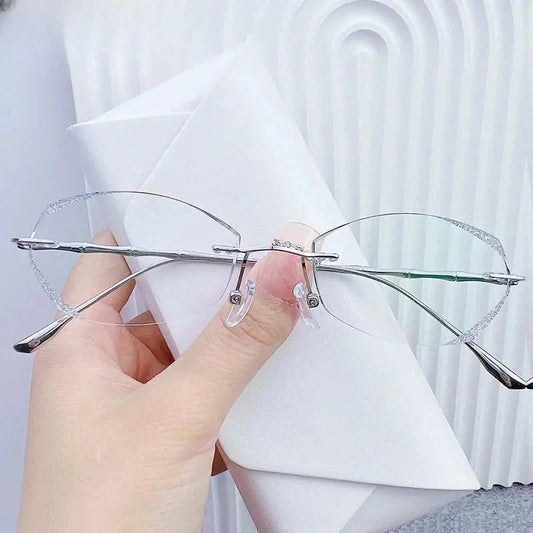Women's Oval Rimless Titanium Prescription Glasses 691073 — view 1 | Rx Spectacle