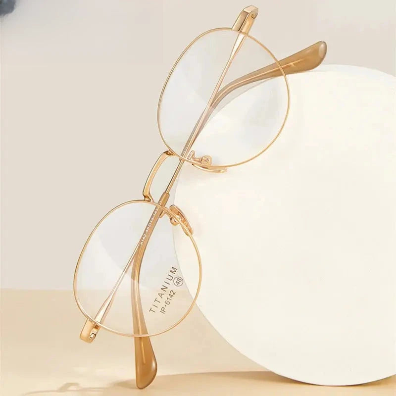 Women's Oval Full Rim Titanium Prescription Glasses 406142 — view 1 | Rx Spectacle