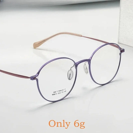 Women's Round Full Rim Titanium Prescription Glasses 99814 — view 1 | Rx Spectacle
