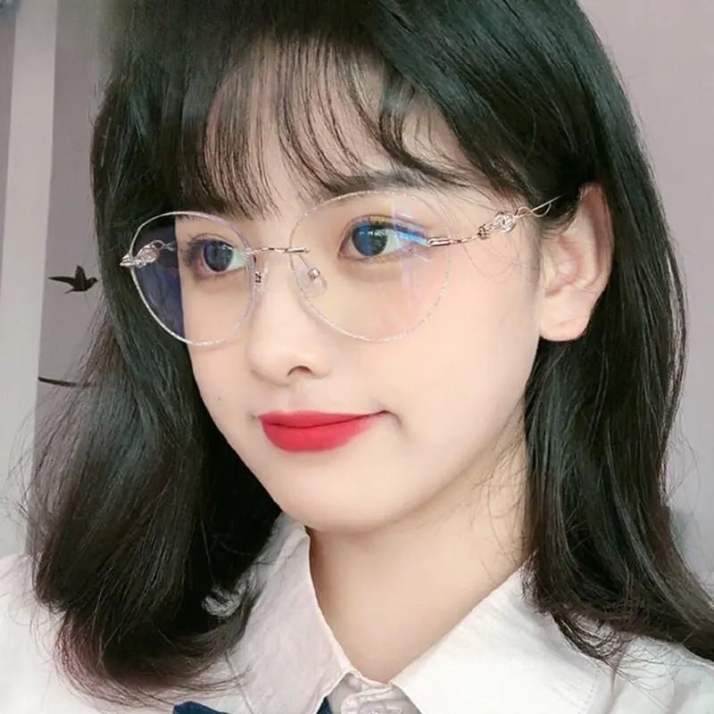 Women's Round Rimless Titanium Prescription Glasses 88128 — view 3 | Rx Spectacle