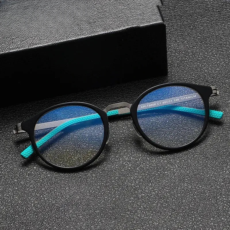 Unisex Round Full Rim Titanium Prescription Glasses 39606 — view 1 | Rx Spectacle